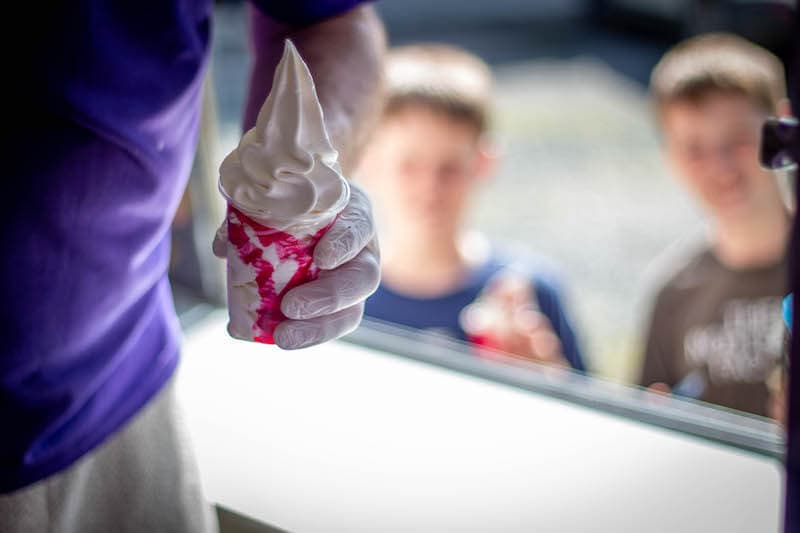 A 99 with raspberry sauce being handed out through the van hatch