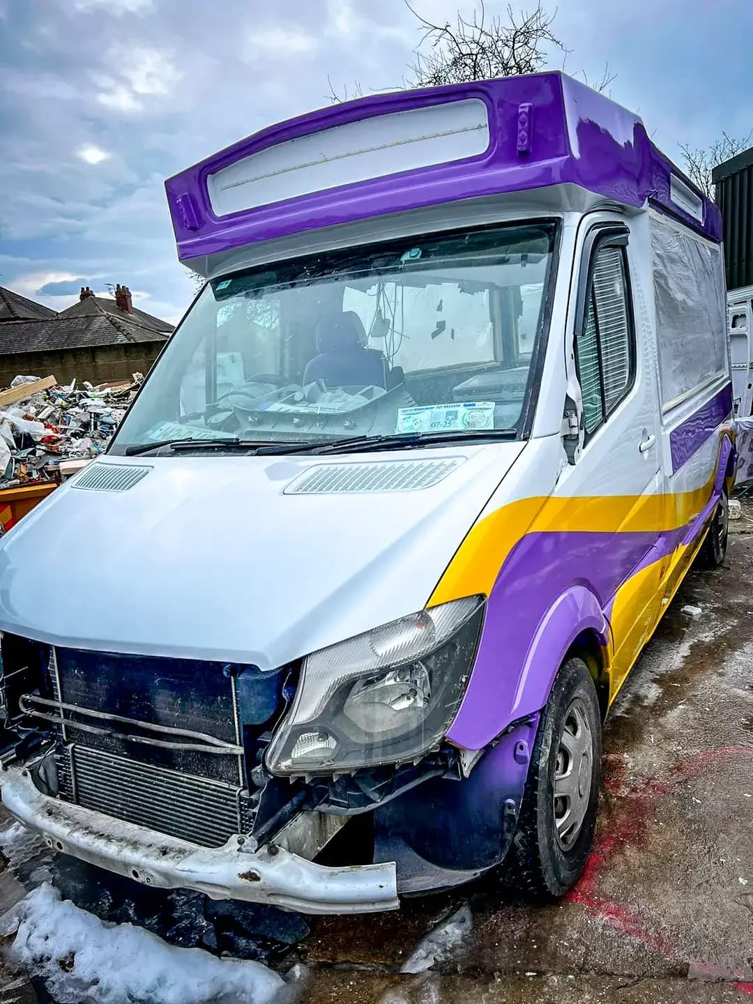 The newest van from the side, hatch closed